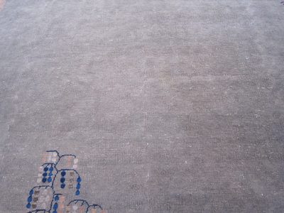Bottom center of carpet
